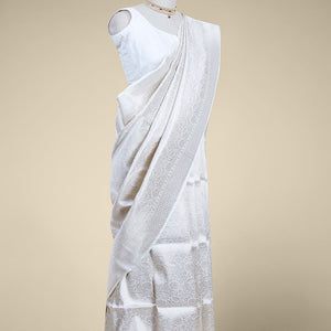 Cream floral jacquard banaras silk saree with self intricate zari border