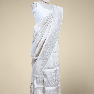 Cream floral jacquard banaras silk saree with self intricate zari border