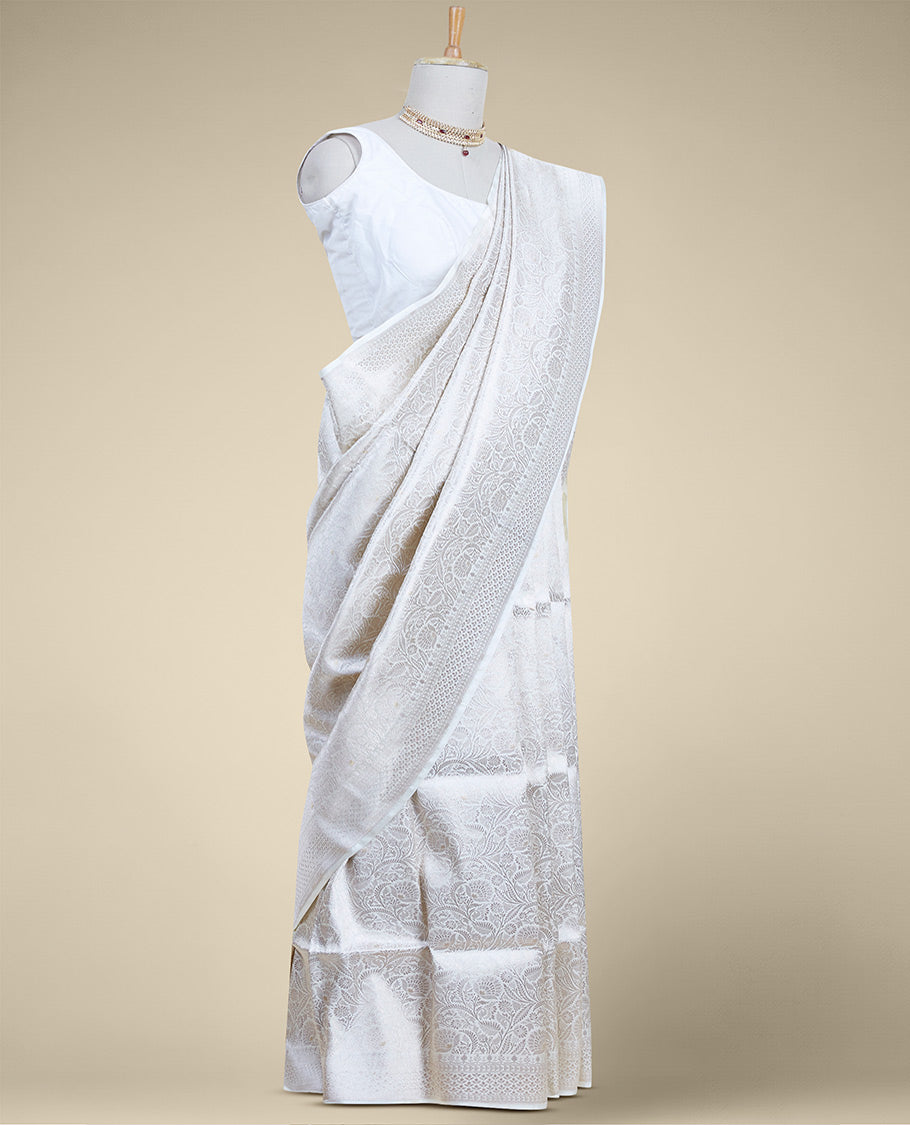 Cream floral jacquard banaras silk saree with self intricate zari border