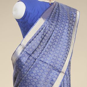 Blue leaf design tusser silk saree with self zari border