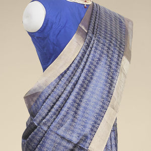 Blue  intricate zari design tusser silk saree with self-zari border