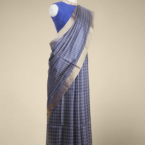 Blue  intricate zari design tusser silk saree with self-zari border