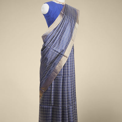 Blue  intricate zari design tusser silk saree with self-zari border
