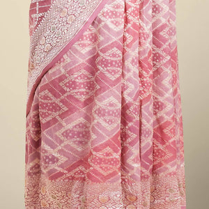 Maroon geometric jacquard banaras crepe saree with self floral zari border