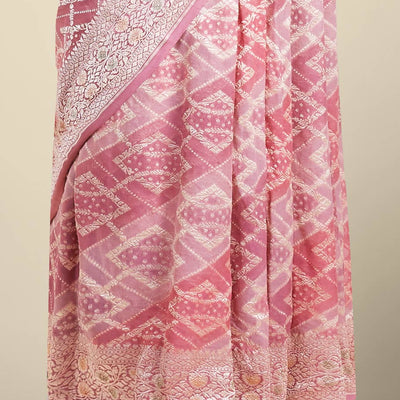 Maroon geometric jacquard banaras crepe saree with self floral zari border