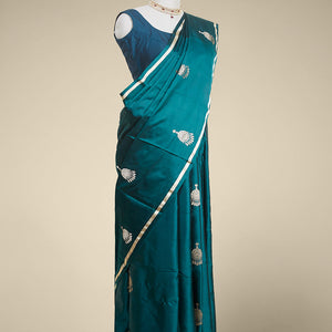 Green buttas kathan silk saree  with self zari border