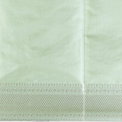 Green floral jacquard kathan silk saree with self-intricate zari border