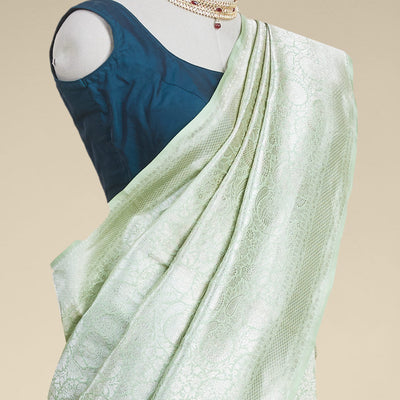 Green floral jacquard kathan silk saree with self-intricate zari border