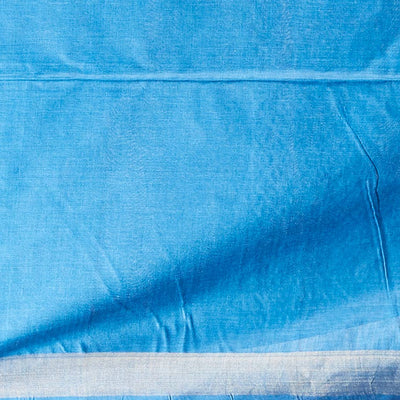 Blue  floral buttas tusser silk saree with self zari border