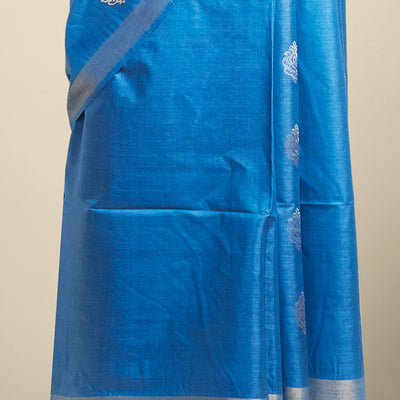 Blue  floral buttas tusser silk saree with self zari border