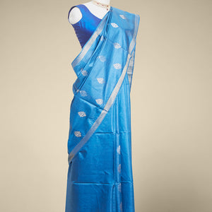 Blue  floral buttas tusser silk saree with self zari border