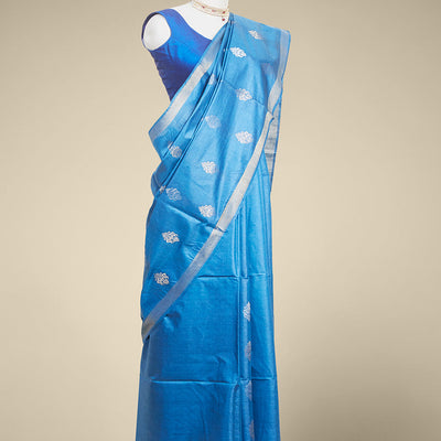 Blue  floral buttas tusser silk saree with self zari border