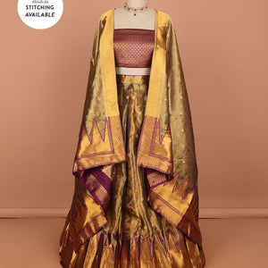 Brown buttas art silk half saree with contrast zari border, argyle pattern blouse & buttas with zari border dhavani