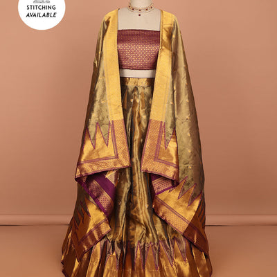 Brown buttas art silk half saree with contrast zari border, argyle pattern blouse & buttas with zari border dhavani