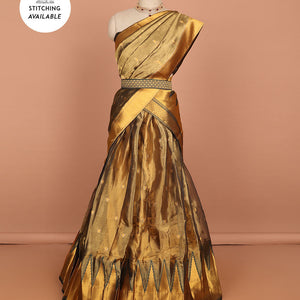 Brown buttas art silk half saree with contrast zari border, argyle pattern blouse & buttas with zari border dhavani