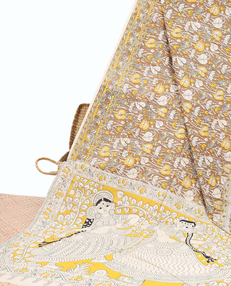 Brown floral machine-printed kalamkari cotton saree, floral creeper border & contrast human figurines pallu