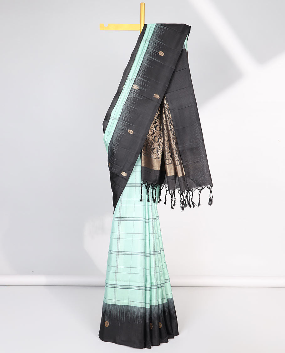 Green checked mayuri soft silk saree with contrast floral border & checked zari design pallu