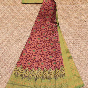 Maroon Semi banaras jute cotton saree features floral vine, contrast zari design border & pallu of intricate designs