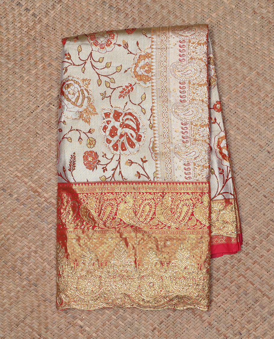 Cream floral jacquard & stone embroidery silksaree,contrast zari & stonework scallop border & intricate pallu