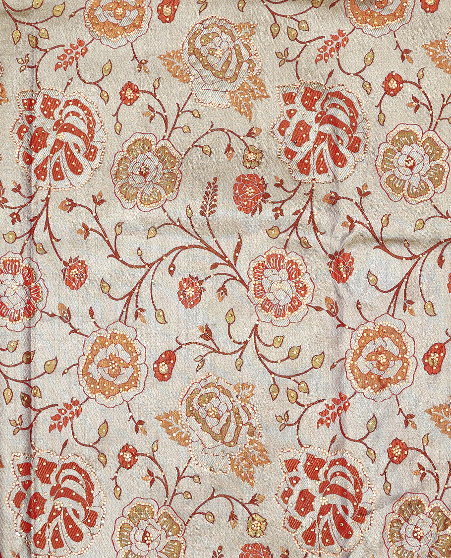 Cream floral jacquard & stone embroidery silksaree,contrast zari & stonework scallop border & intricate pallu