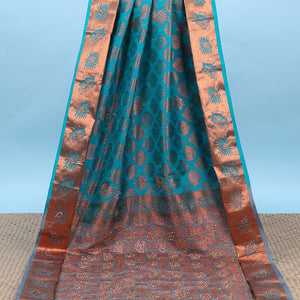 Blue silksaree with zari buttas & stone work, zari border & intricate floral design weave pallu with stone embroidery