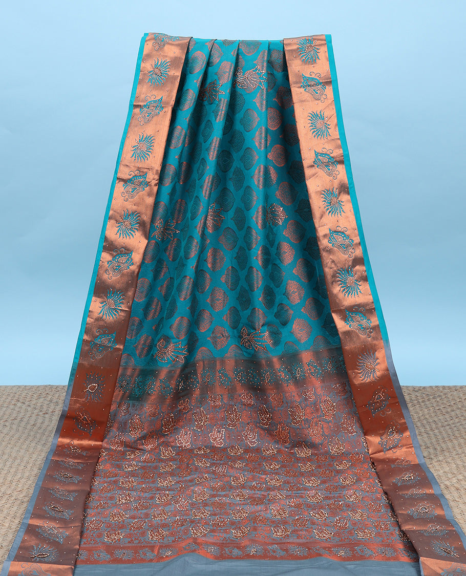 Blue silksaree with zari buttas & stone work, zari border & intricate floral design weave pallu with stone embroidery