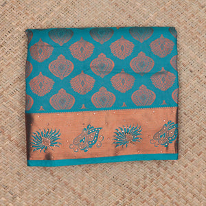 Blue silksaree with zari buttas & stone work, zari border & intricate floral design weave pallu with stone embroidery