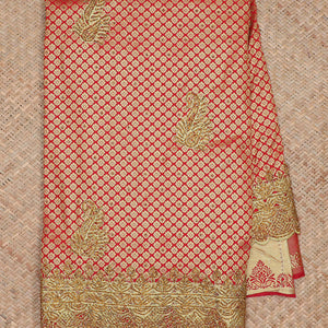 Red jacquard & stonework silksaree,zari & stone embroidery scallop cutwork border & pallu of big paisleys with stonework