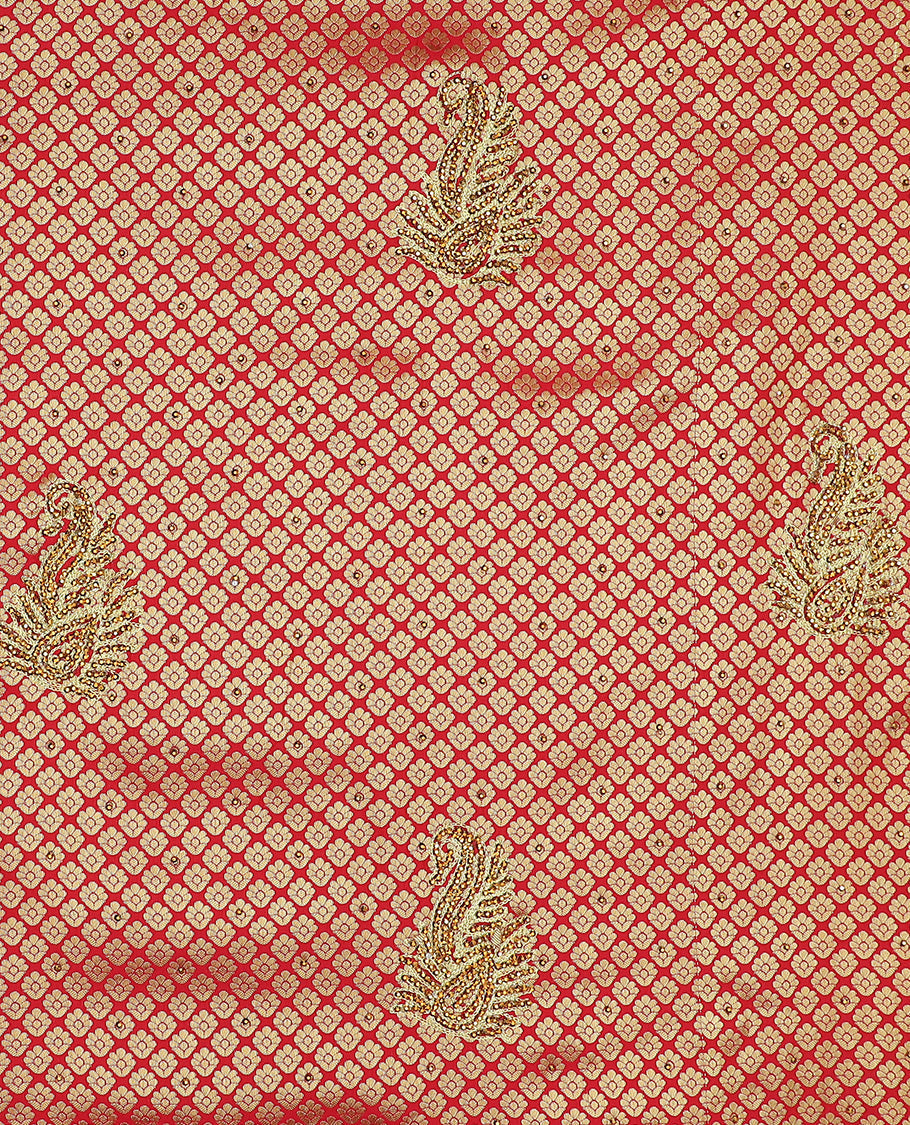 Red jacquard & stonework silksaree,zari & stone embroidery scallop cutwork border & pallu of big paisleys with stonework