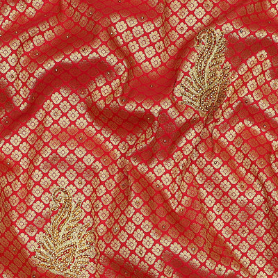 Red jacquard & stonework silksaree,zari & stone embroidery scallop cutwork border & pallu of big paisleys with stonework