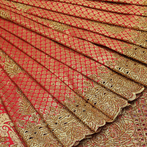 Red jacquard & stonework silksaree,zari & stone embroidery scallop cutwork border & pallu of big paisleys with stonework