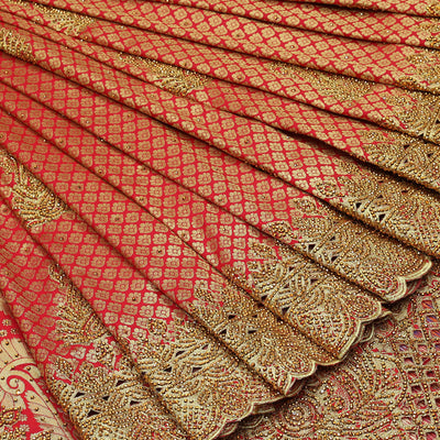 Red jacquard & stonework silksaree,zari & stone embroidery scallop cutwork border & pallu of big paisleys with stonework