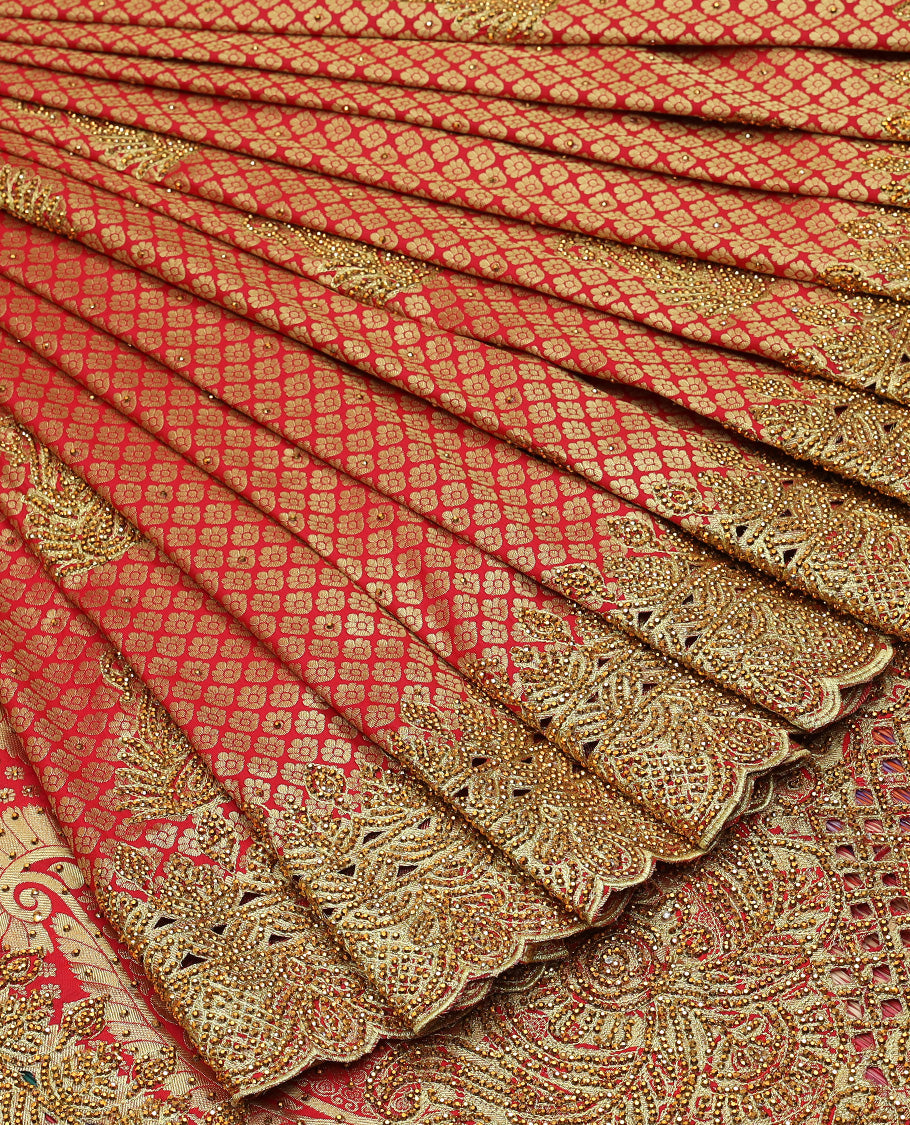 Red jacquard & stonework silksaree,zari & stone embroidery scallop cutwork border & pallu of big paisleys with stonework