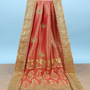 Red jacquard & stonework silksaree,zari & stone embroidery scallop cutwork border & pallu of big paisleys with stonework