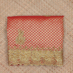 Red jacquard & stonework silksaree,zari & stone embroidery scallop cutwork border & pallu of big paisleys with stonework