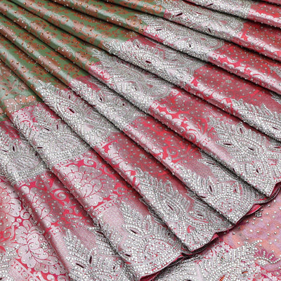 Green floral jacquard & stonework silksaree,contrast zari & stonework scallop border & intricate pallu,allover stonework