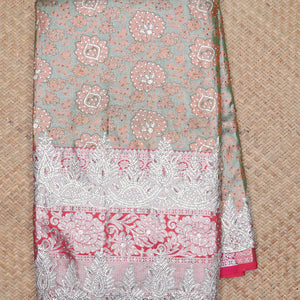 Green floral jacquard & stonework silksaree,contrast zari & stonework scallop border & intricate pallu,allover stonework