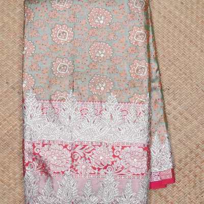 Green floral jacquard & stonework silksaree,contrast zari & stonework scallop border & intricate pallu,allover stonework