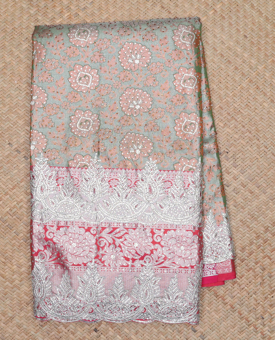 Green floral jacquard & stonework silksaree,contrast zari & stonework scallop border & intricate pallu,allover stonework