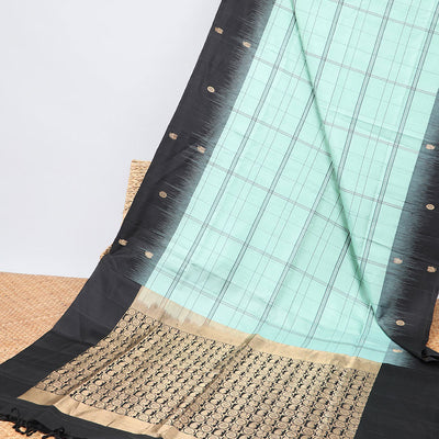 Green checked mayuri soft silk saree with contrast floral border & checked zari design pallu