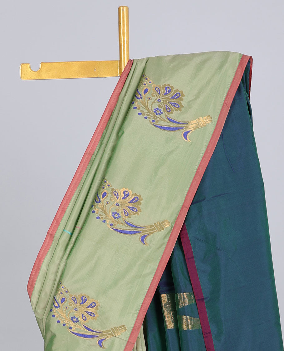 Borderless pastel green aarani gift saree with unique buttas, contrast pallu of traditional designs