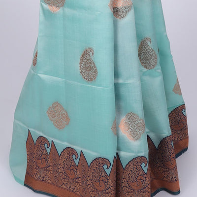 Pastel blue butter silk saree with zari buttas, contrast border of paisleys & peacock & ogee patterned pallu