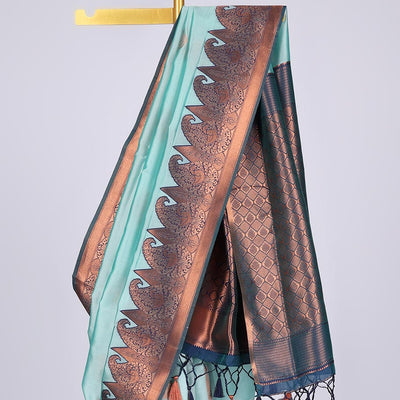Pastel blue butter silk saree with zari buttas, contrast border of paisleys & peacock & ogee patterned pallu