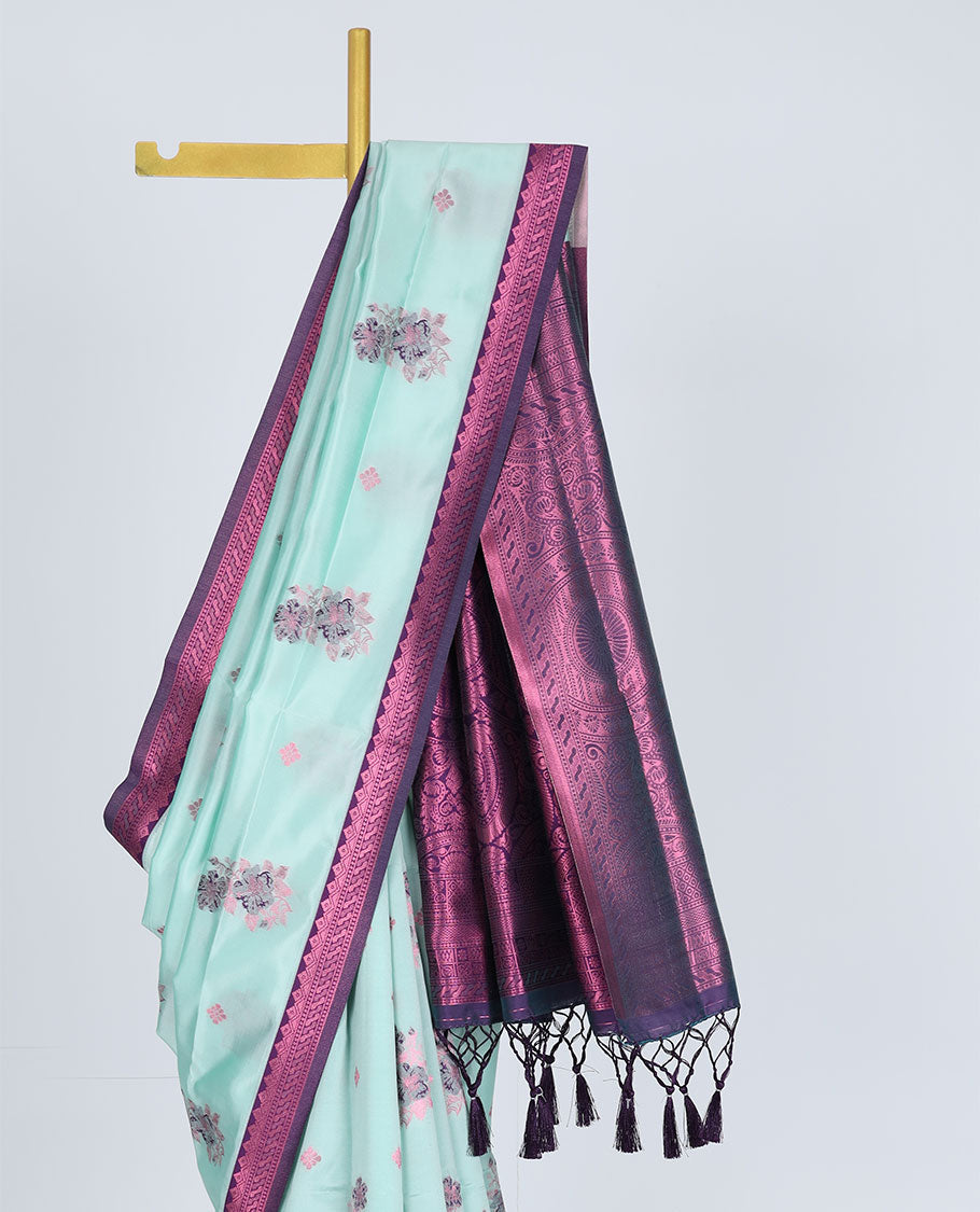 Celeste blue butter silk saree with floral buttas, contrast rose copper zari design border & intricate pallu