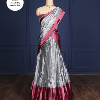 Silver grey tissue half-saree, contrast traditional motifs border, jacquard blouse & dhavani of intricate designs