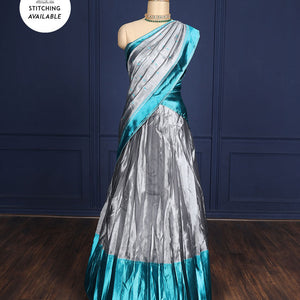 Silver grey tissue half-saree, contrast traditional motifs border, jacquard blouse & dhavani of intricate designs