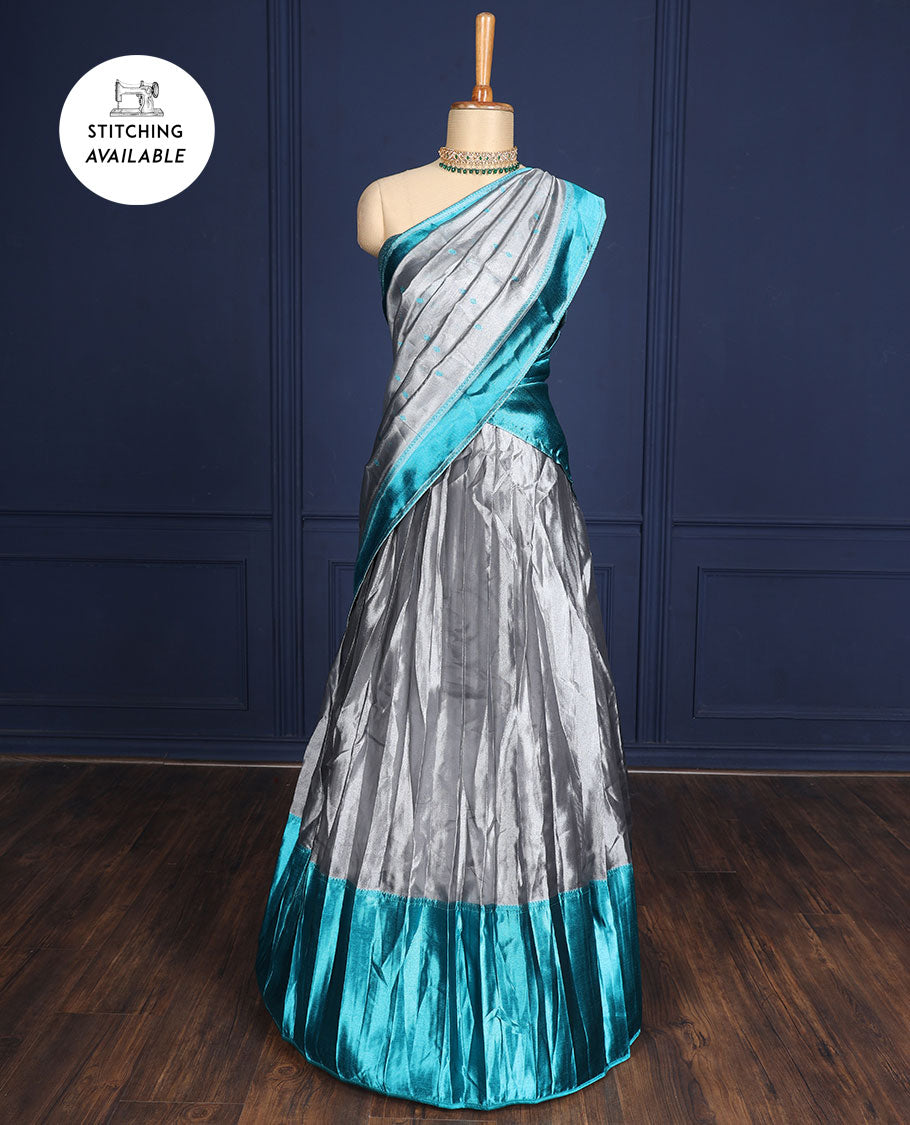 Silver grey tissue half-saree, contrast traditional motifs border, jacquard blouse & dhavani of intricate designs