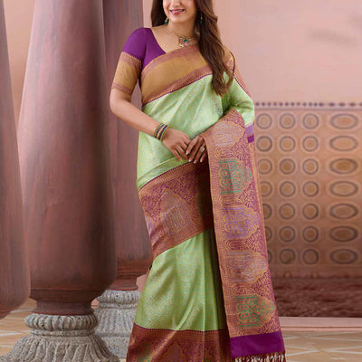 Green floral jacquard silksaree,contrast jaal pallu & korvai meenakari border of thilakam mokku,banaras,muthu,poun,manga