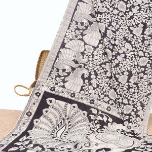 Black floral vine & peacock machine-printed kalamkari cotton saree, self-border & peacock motifs pallu