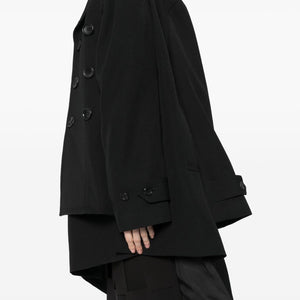 Comme Des Garcons Complete with asymmetrical sleeves